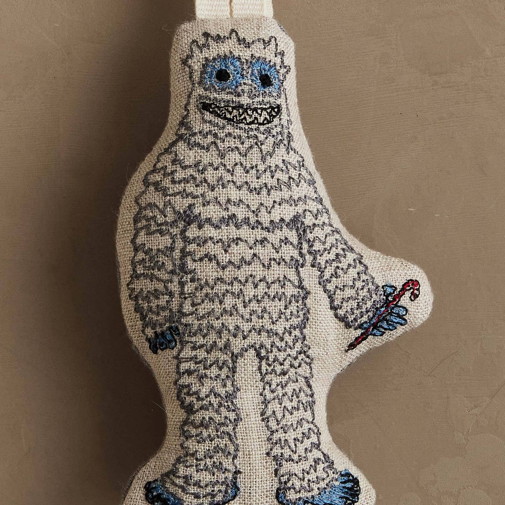 Yeti with Candy Cane Ornament