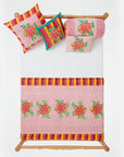Lisa Corti Camelia Pink Magenta Throw Junior Quilt Block print cotton quilt at Collyer's Mansion