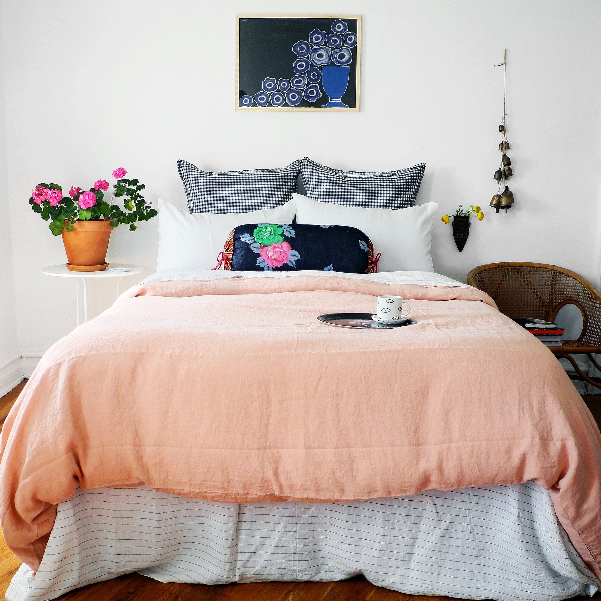 A Linge Particulier Linen Duvet in Copper gives a salmon and pink color to this duvet for a colorful linen bedding look from Collyer's Mansion