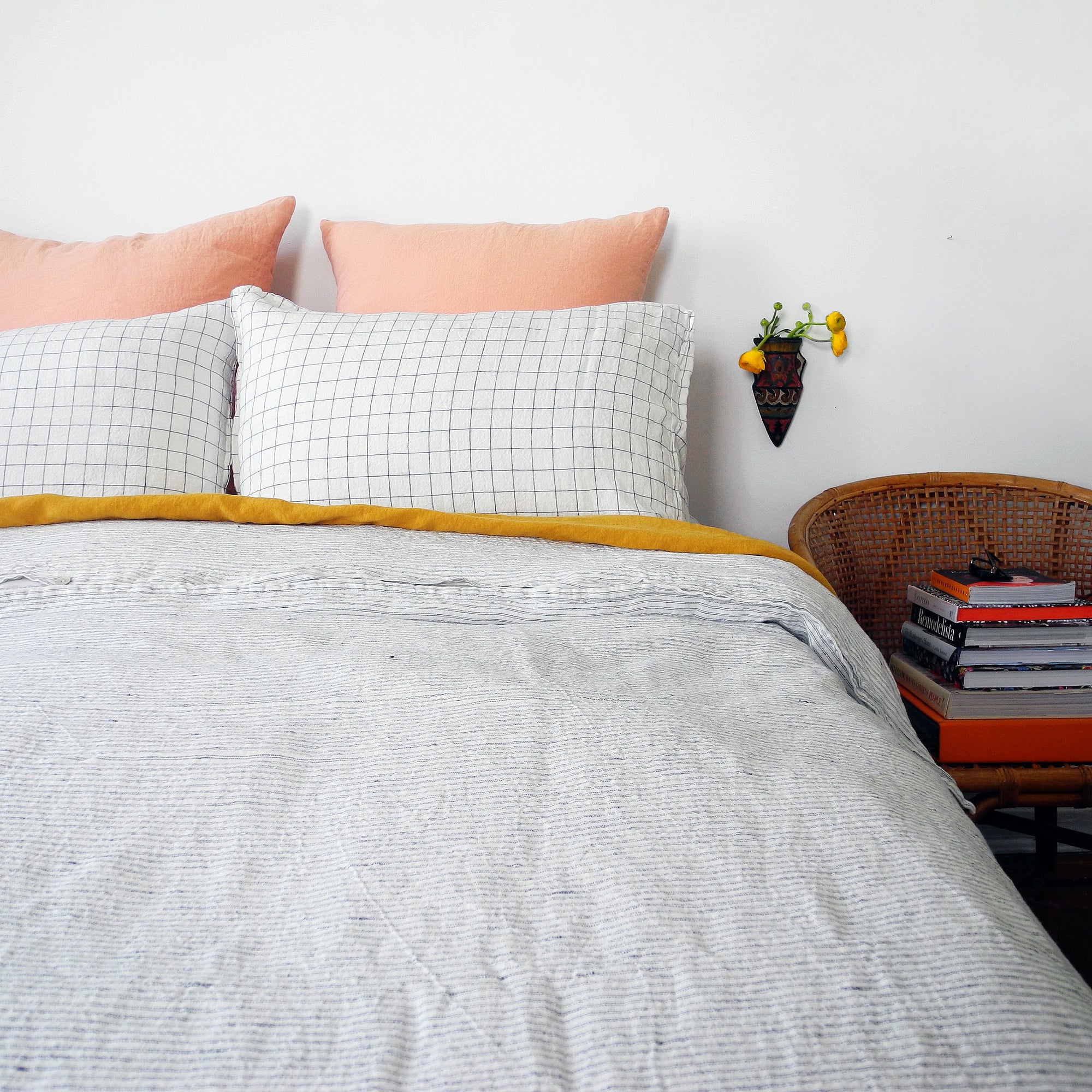 Linge Particulier Navy Check Standard Linen Pillowcase Sham with a stripe linen duvet and copper euro shams for a colorful linen bedding look in blue check - Collyer's Mansion