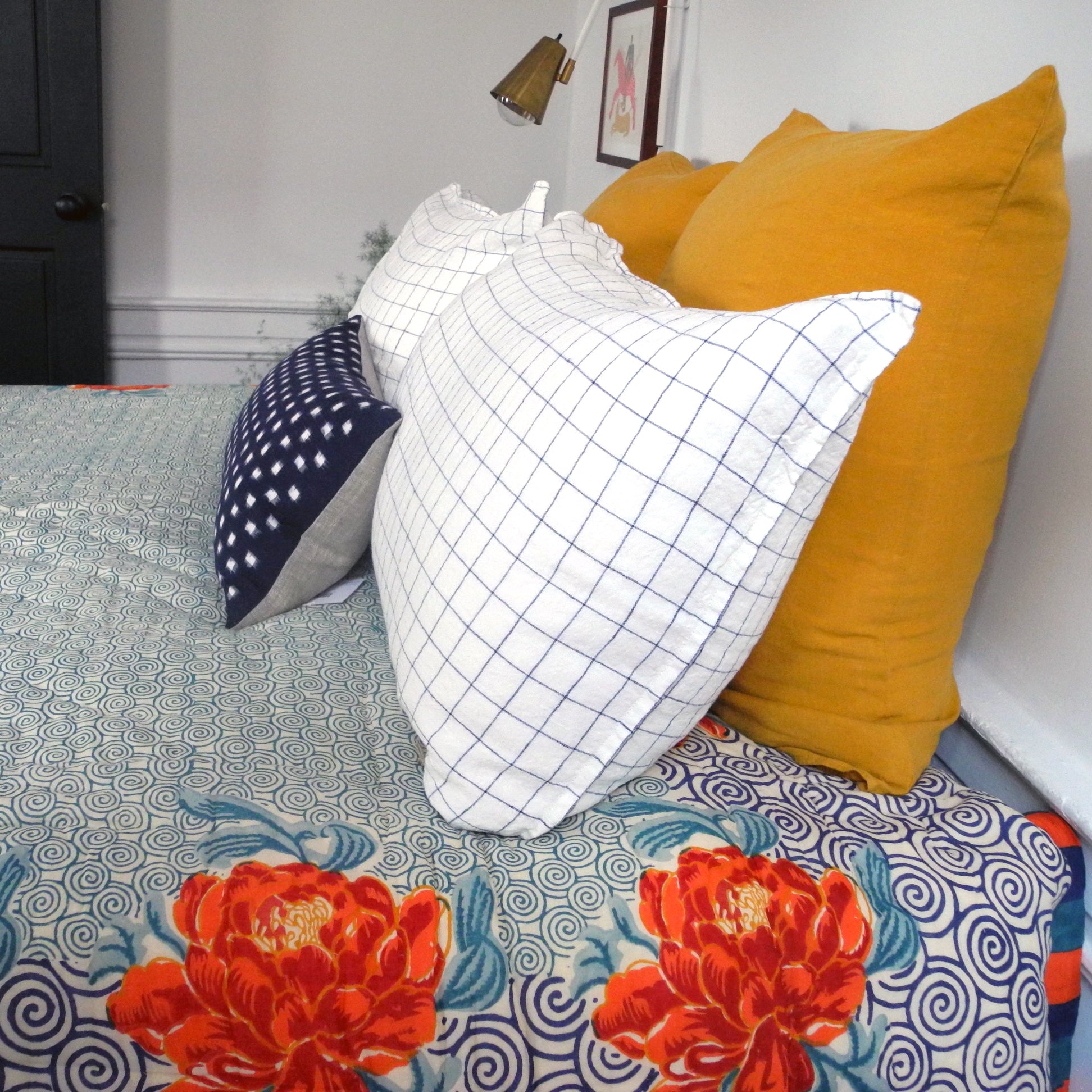 Linge Particulier Honey Yellow Euro Linen Pillowcase Sham with a Lisa Corti quilt and navy check pillowcases for a colorful linen bedding look in mustard yellow - Collyer&#39;s Mansion