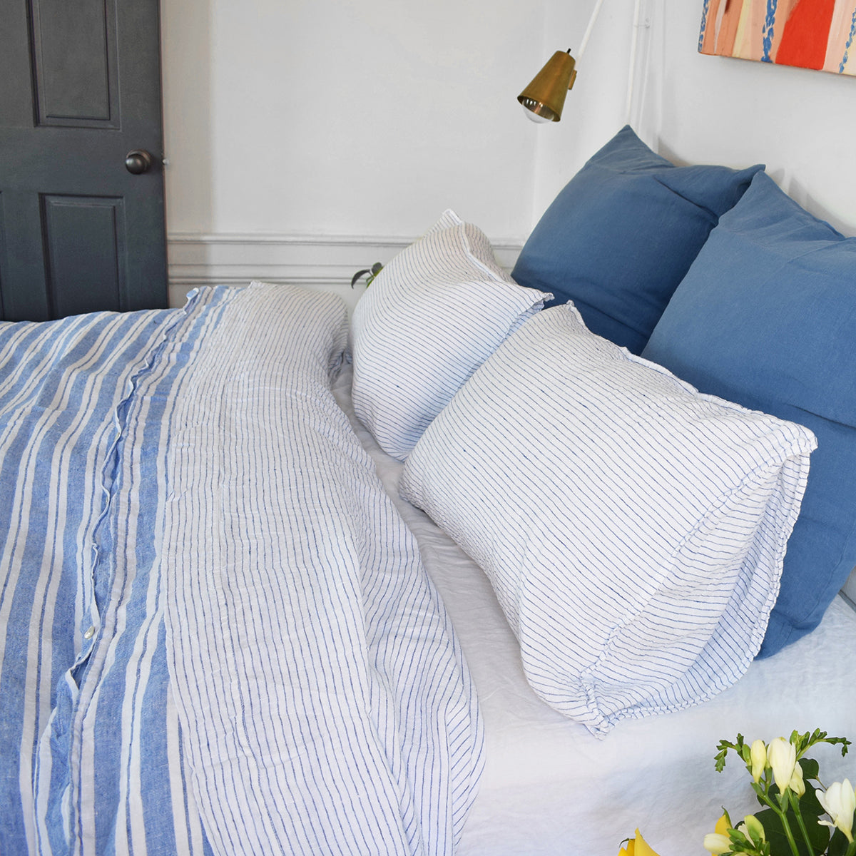 Linge Particulier Atlantic Blue Euro Linen Pillowcase Sham with a blue stripe linen duvet for a colorful linen bedding look in electric blue - Collyer's Mansion