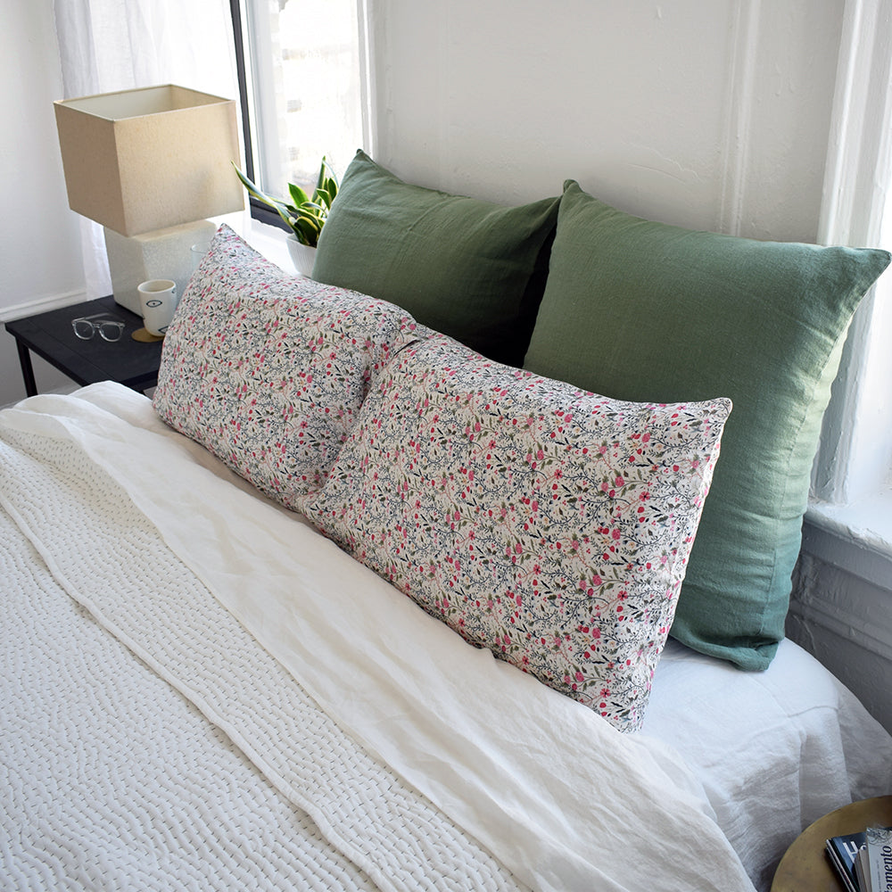 Linge Particulier Jade Green Euro Linen Pillowcase Sham with pink floral pillowcases and stitched Indian quilt for a colorful linen bedding look in camo green - Collyer&#39;s Mansion