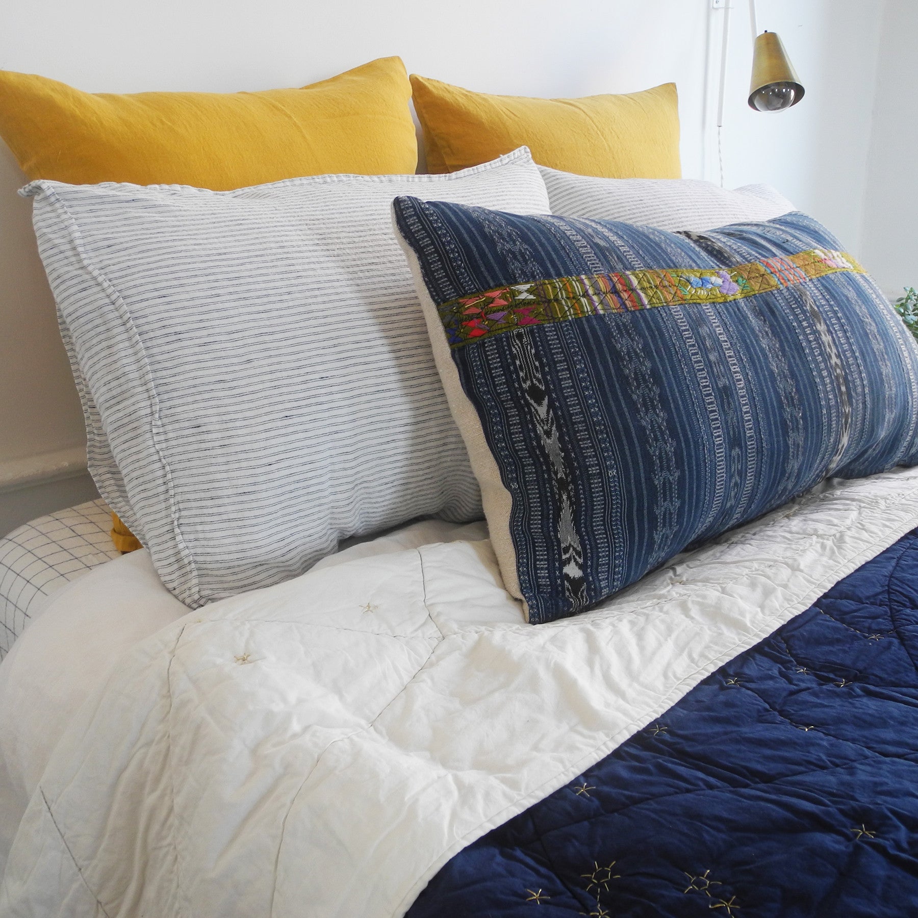 Linge Particulier Honey Yellow Euro Linen Pillowcase Sham with a Haptic Lab constellation quilt for a colorful linen bedding look in mustard yellow - Collyer's Mansion