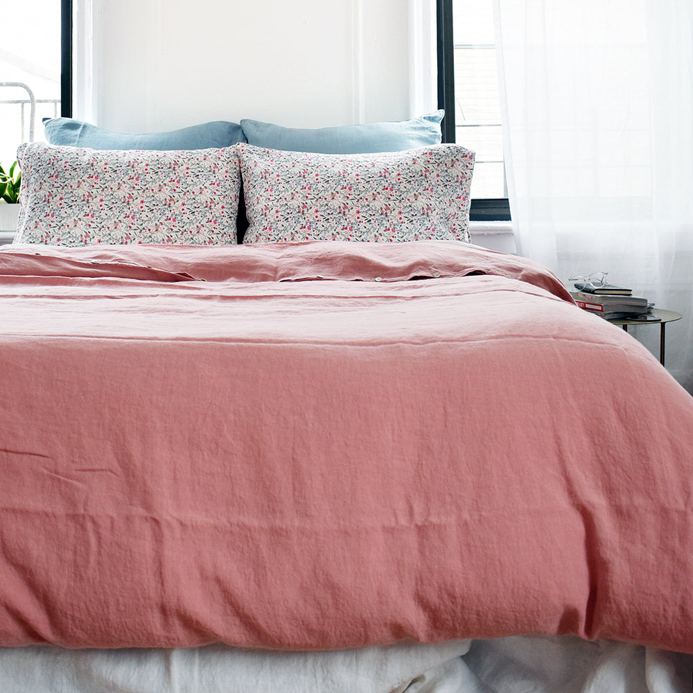 A Linge Particulier Linen Duvet in Lychee gives a deep salmon and old pink color to this duvet for a colorful linen bedding look from Collyer&#39;s Mansion