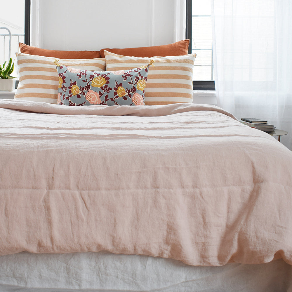 This Linge Particulier nude linen duvet adds a bit of blush and pink to your colorful linen bedding look from Collyer&#39;s Mansion