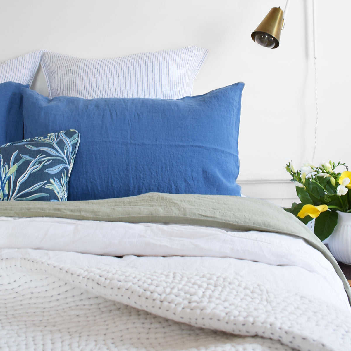 Linge Particulier Atlantic Blue Standard Linen Pillowcase Sham with Utopia Goods pillow and blue stripe euro shams for a colorful linen bedding look in electric blue - Collyer's Mansion