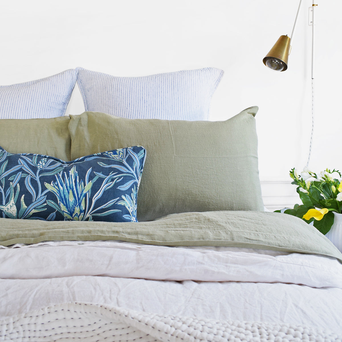 Linge Particulier Fennel Green Standard Linen Pillowcase Sham with Utopia Goods pillow and blue stripe euro shams for a colorful linen bedding look in olive green - Collyer's Mansion