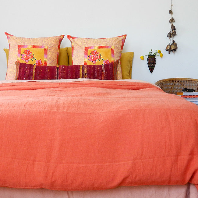 A Linge Particulier Linen Duvet in Terracotta gives a vibrant orange and sunset color to this duvet for a colorful linen bedding look from Collyer&#39;s Mansion