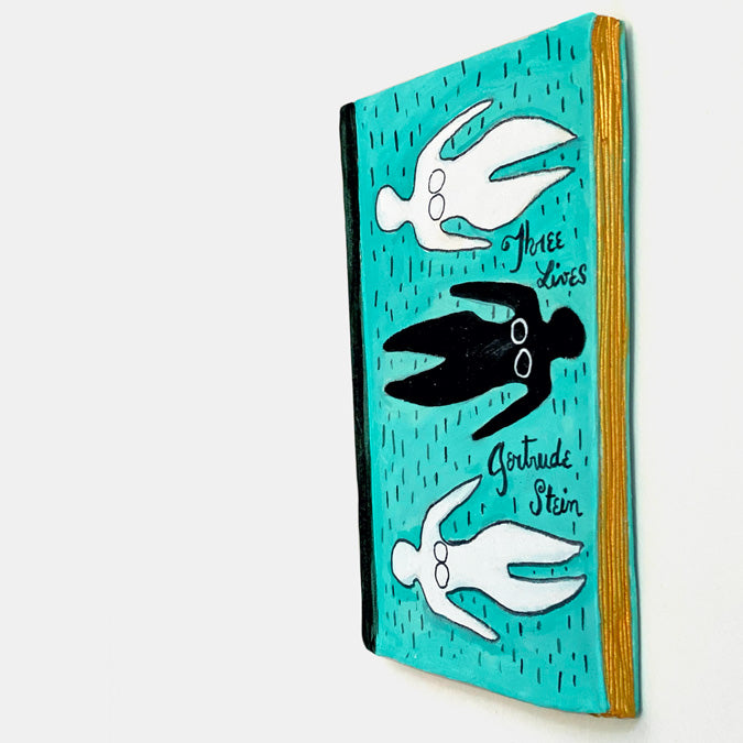 Teal Book Wall Art by The Clay Brush
