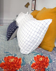 Linge Particulier Honey Yellow Euro Linen Pillowcase Sham with a Lisa Corti quilt and navy check pillowcases for a colorful linen bedding look in mustard yellow - Collyer's Mansion
