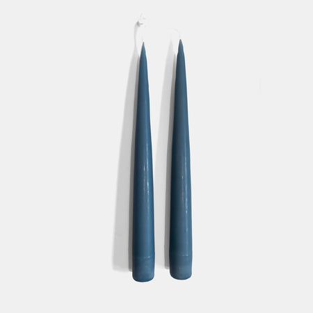 a pair of blue candles