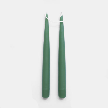 a pair of green candles