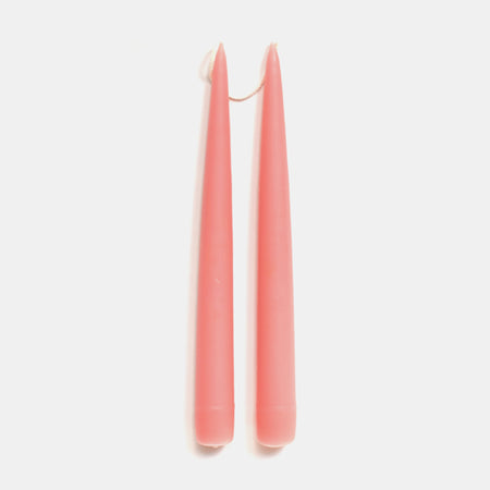 a pair of pink candles