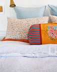 Linge Particulier Scandinavian Blue Euro Linen Pillowcase Sham with a Lisa Corti pillow and small warm floral pillowcases for a colorful linen bedding look in grey blue - Collyer's Mansion