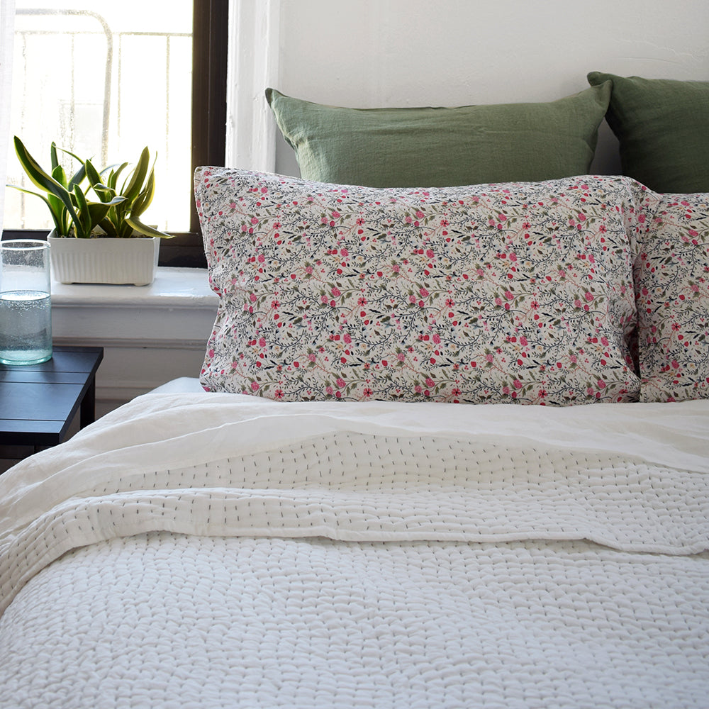 Linge Particulier Jade Green Euro Linen Pillowcase Sham with pink floral pillowcases and stitched Indian quilt for a colorful linen bedding look in camo green - Collyer&#39;s Mansion