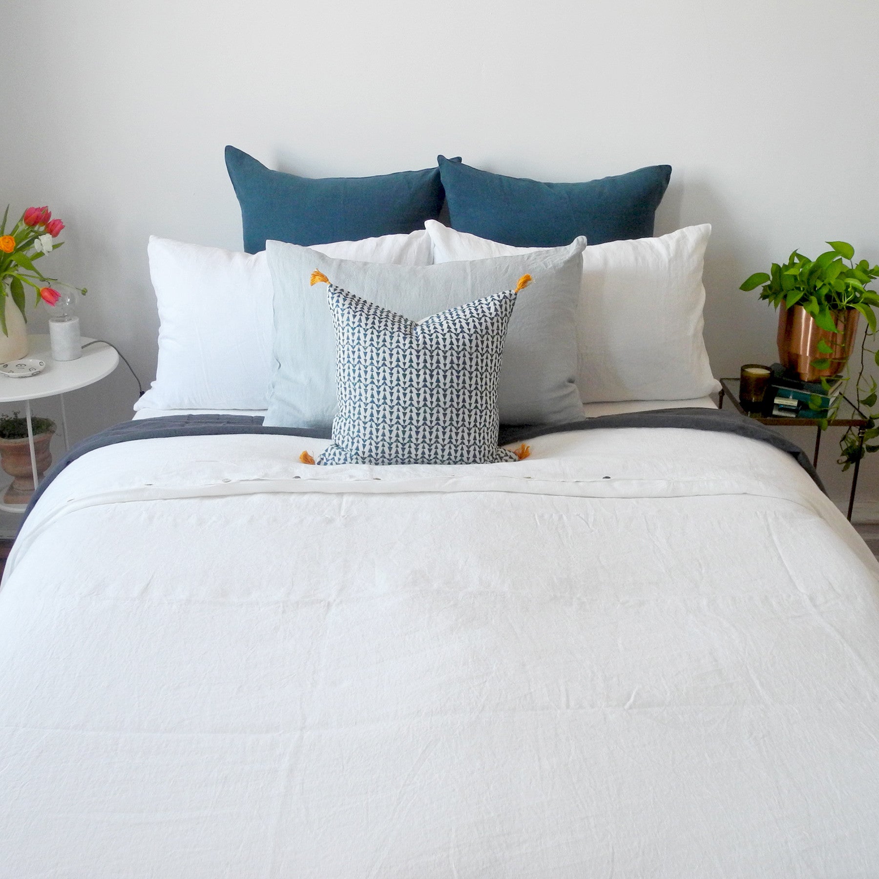 Linge Particulier Off White Standard Linen Pillowcase Sham with blue pillows for a colorful linen bedding look in soft white - Collyer&#39;s Mansion