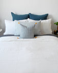 Linge Particulier Off White Standard Linen Pillowcase Sham with blue pillows for a colorful linen bedding look in soft white - Collyer's Mansion