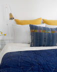 Linge Particulier Honey Yellow Euro Linen Pillowcase Sham with a Haptic Lab constellation quilt for a colorful linen bedding look in mustard yellow - Collyer's Mansion