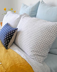 Linge Particulier Pale Blue Euro Linen Pillowcase Sham with a honey yellow linen duvet for a colorful linen bedding look in light blue - Collyer's Mansion