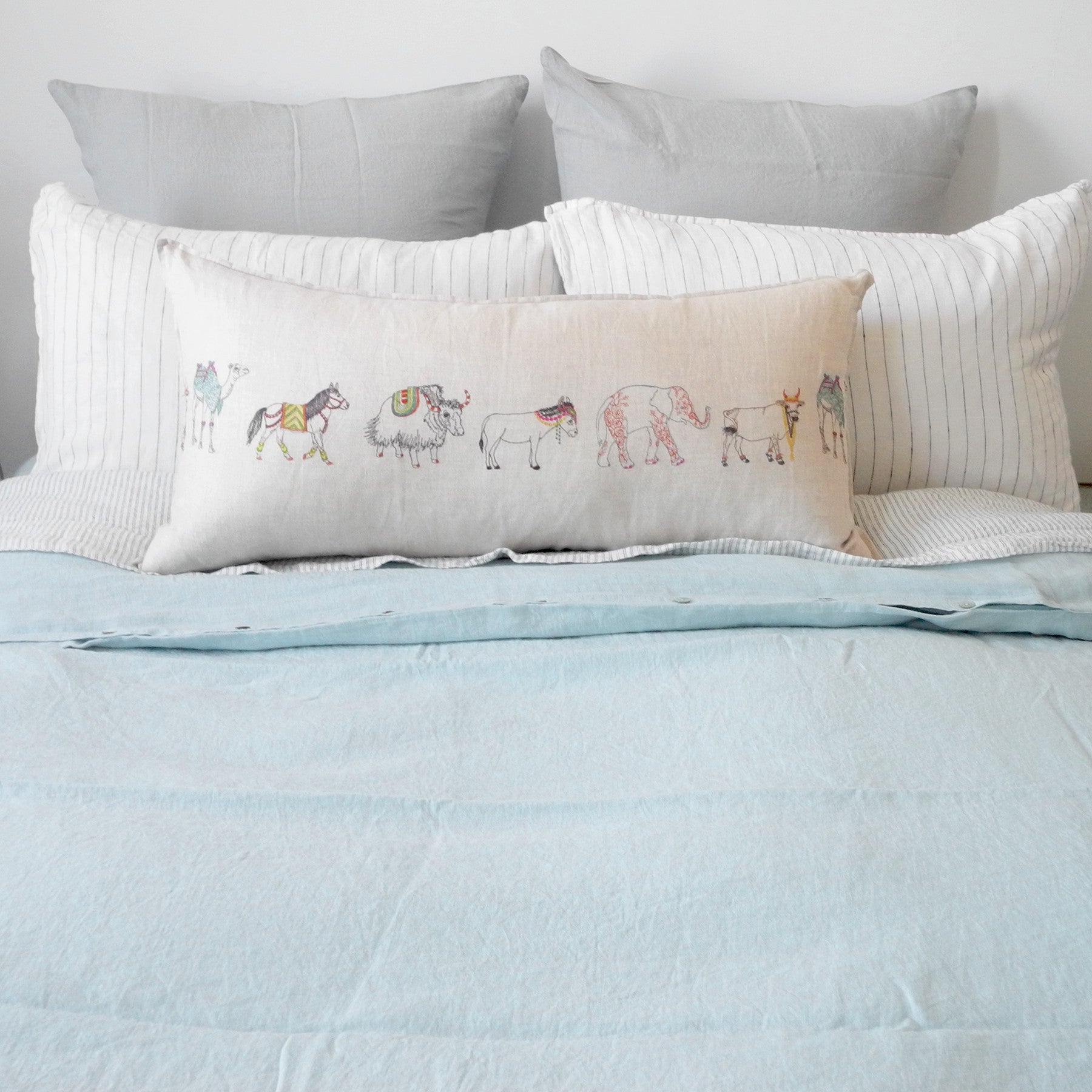 Linge Particulier Cloud Grey Euro Linen Pillowcase Sham with a pale blue linen duvet and Coral &amp; Tusk pillow for a colorful linen bedding look in light grey - Collyer&#39;s Mansion