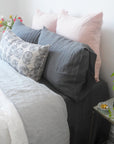 Linge Particulier Storm Grey Standard Linen Pillowcase Sham with nude euro shams and Coral & Tusk pillow for a colorful linen bedding look in charcoal grey - Collyer's Mansion