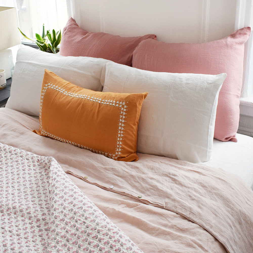 Go monochrome with this blush linen duvet and pink linen pillowcases