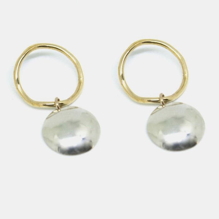 Slantt Petite Pilar Earrings are beautiful brass hoops with sterling silver domes and are the perfect statement earrings - Collyer's Mansion