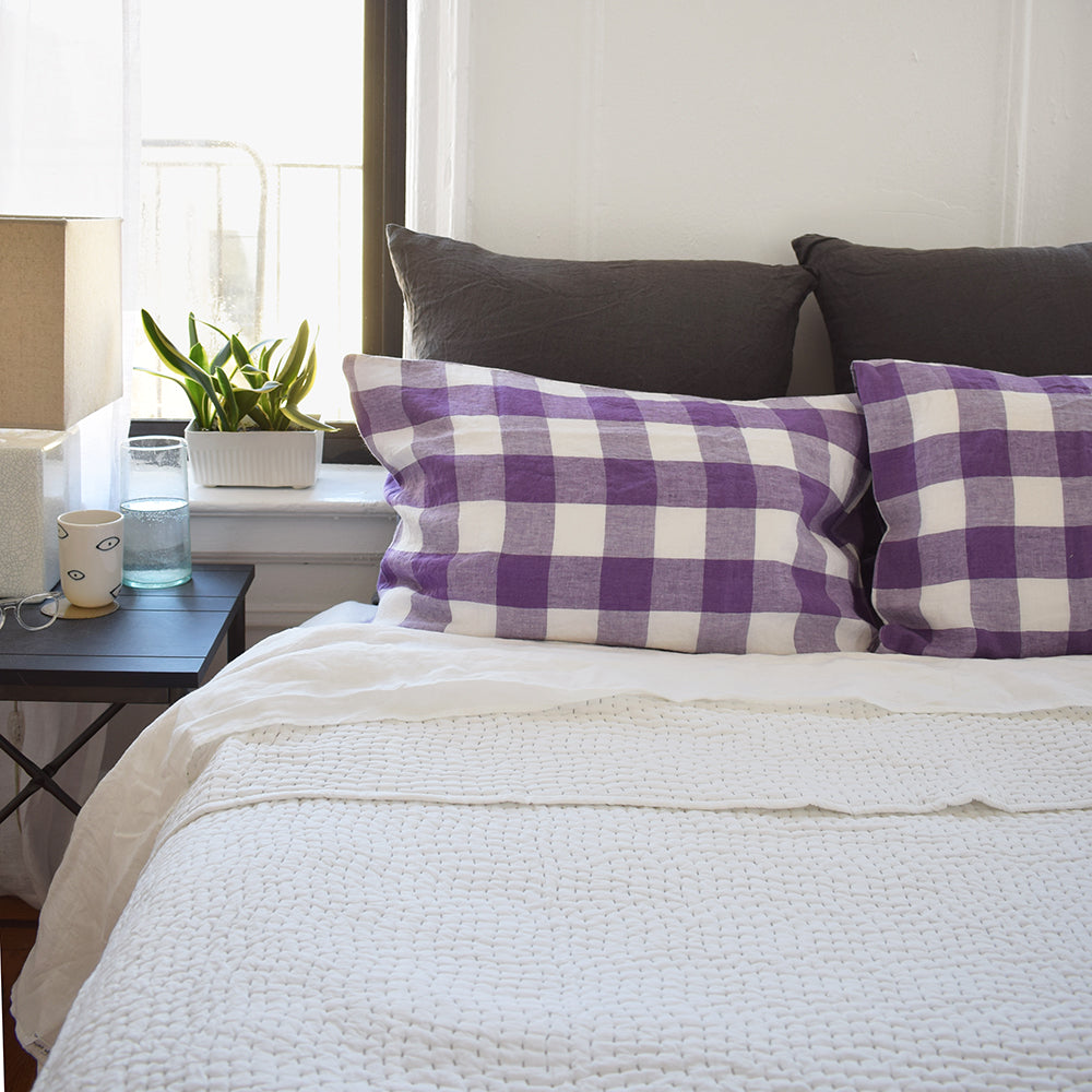 Linge Particulier Storm Grey Euro Linen Pillowcase Sham with a stitched Indian quilt and violet purple gingham pillowcases for a colorful linen bedding look in charcoal grey - Collyer&#39;s Mansion